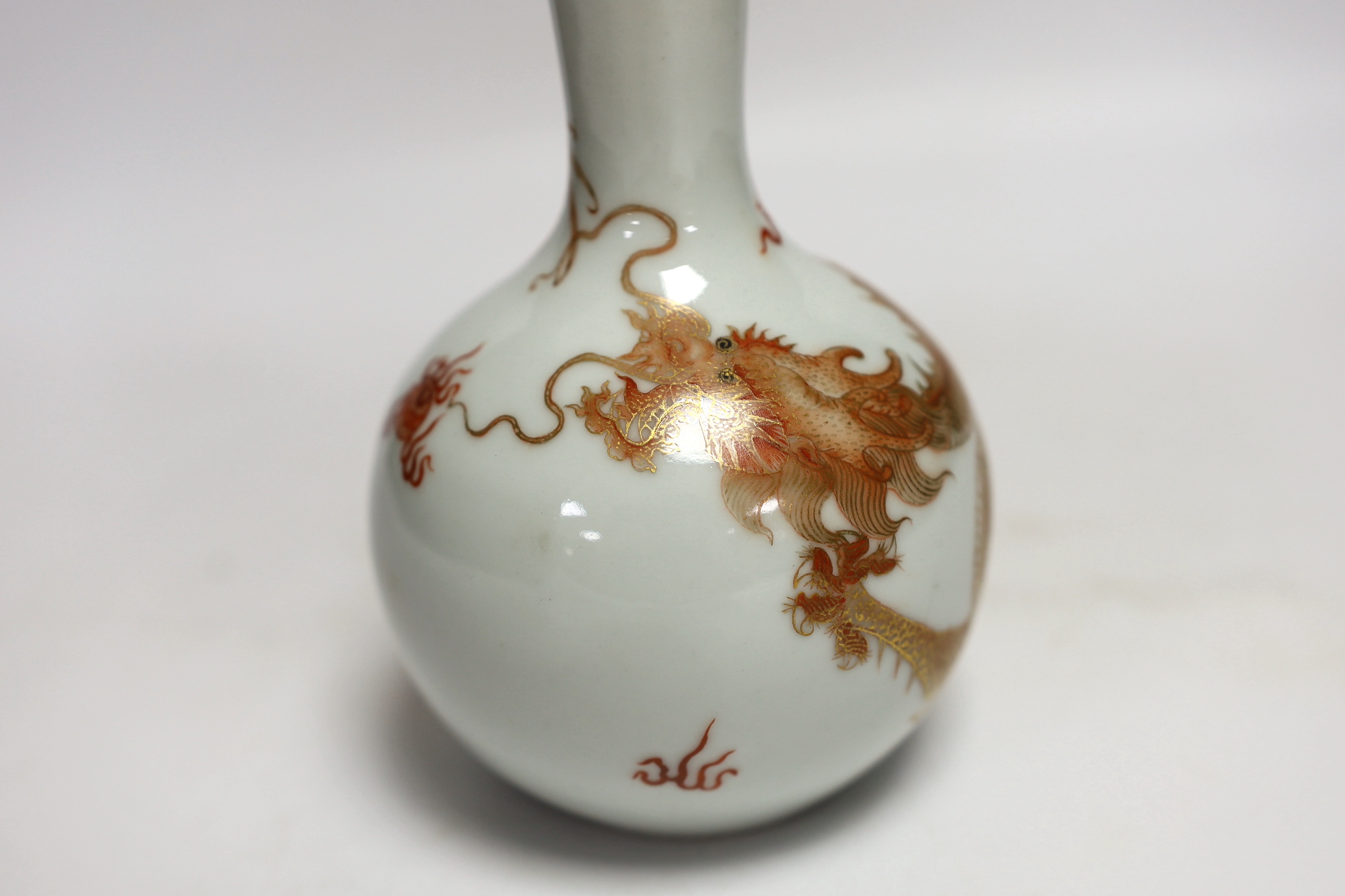 A Chinese rouge de fer dragon bottle vase, 14cm high (boxed)